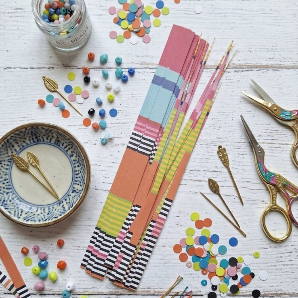 pre-cut paper strips to create paper beads