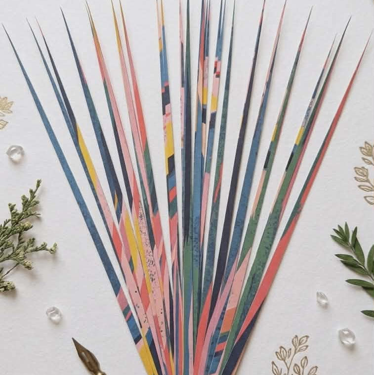 Colorful  pre cut paper strips with decorative elements on a light background