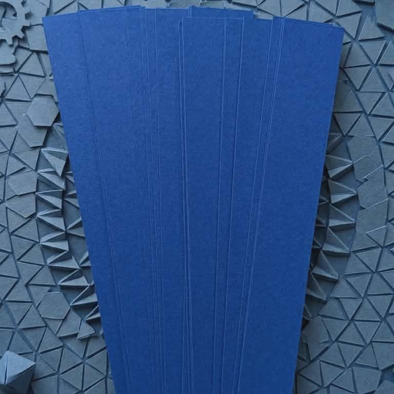 Blue 16 mm barrel-shaped paper bead strips with chips of blue background