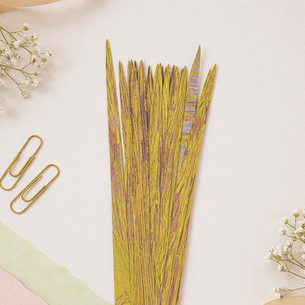 Pre-cut gold woodgrain paper bead strips for handmade jewelry and bead crafting