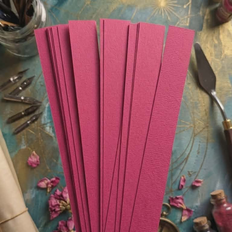Pink 16 mm barrel-shaped paper bead strips with mystical background